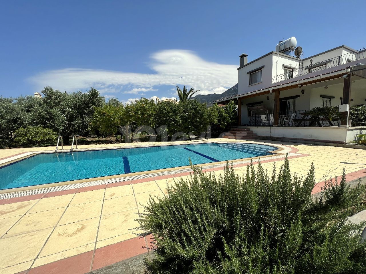 3 bedroom villa with a private pool. It has a lot of mature fruit trees, closed garage.water well.Ready title deed on owners name. no VAT.05338403555