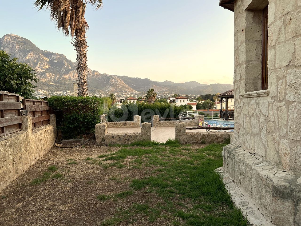 spectacular stone house is only 200 meters from the sea in Karşıyaka, Girne. Solid stone house with 4 bedrooms. It has a private swimming pool, study room and closed garage. You are welcome to the terrace of this villa for the most perfect sunset on the island.