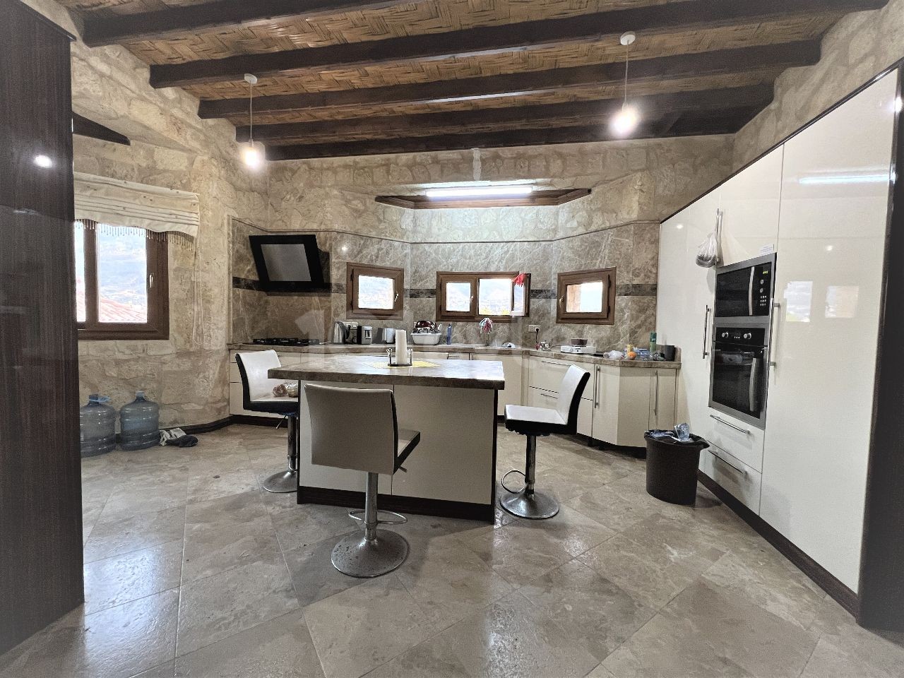 spectacular stone house is only 200 meters from the sea in Karşıyaka, Girne. Solid stone house with 4 bedrooms. It has a private swimming pool, study room and closed garage. You are welcome to the terrace of this villa for the most perfect sunset on the island.