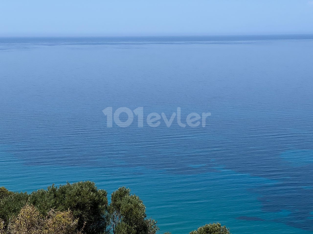 The beachfront land in Kyrenia Kayalar village. There is a Decency difference between the sea and the land. A magnificent land overlooking a magnificent bay. 05338403555 ** 