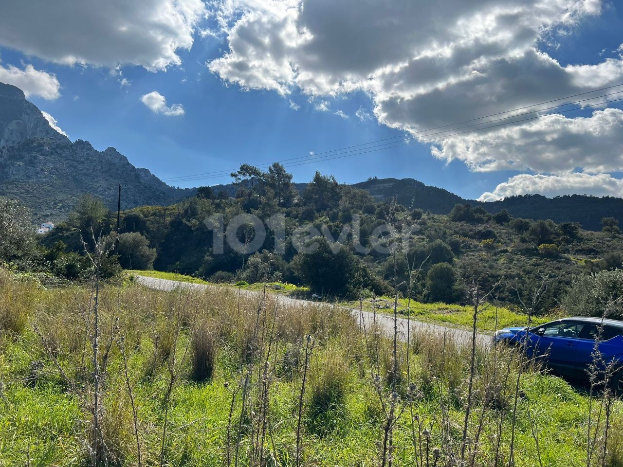 3.5 acres of land with mountain and sea views in Karsiyaka, Kyrenia. 05338403555 ** 