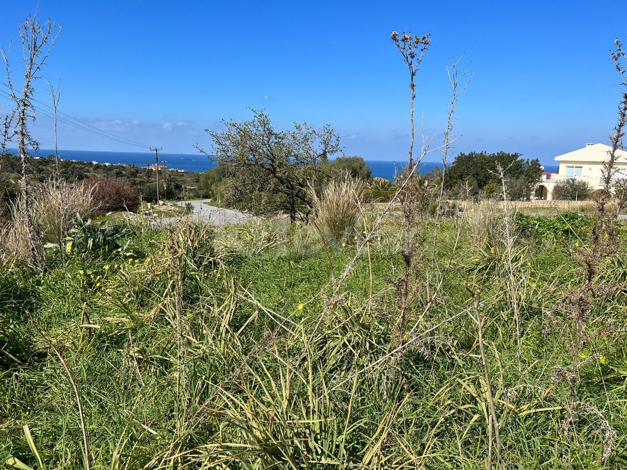 3.5 acres of land with mountain and sea views in Karsiyaka, Kyrenia. 05338403555 ** 