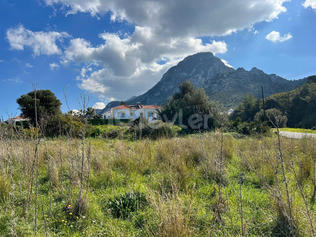 3.5 acres of land with mountain and sea views in Karsiyaka, Kyrenia. 05338403555 ** 