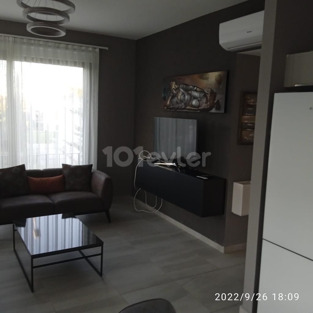 Fully furnished apartment with ground floor garden in a well-kept complex with 24x7 security in Alsancak, Kyrenia. 05338403555