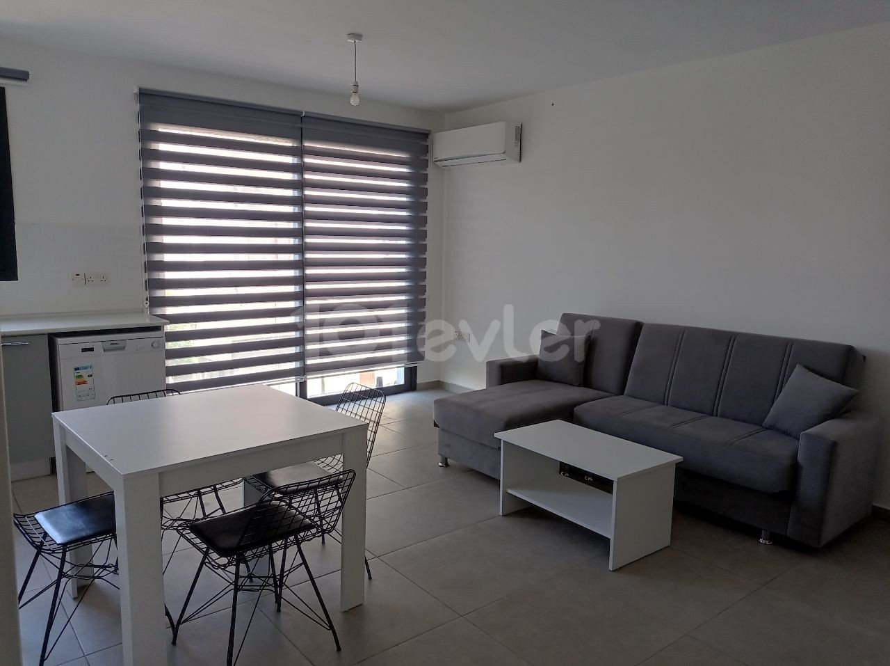 2 + 1 Furnished apartment for rent with indoor parking in the central location in the Yenişehir region ** 