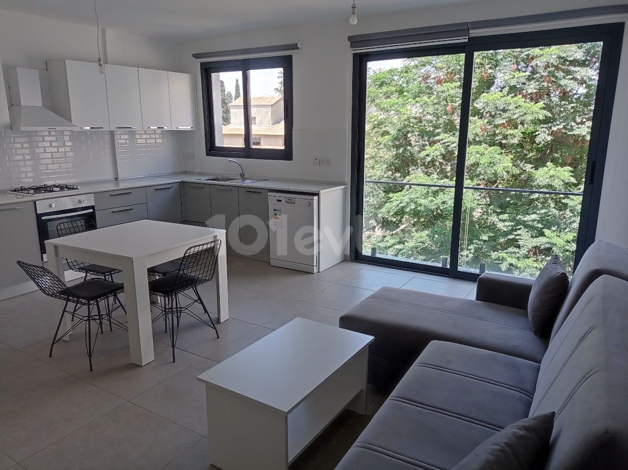 2 + 1 Furnished apartment for rent with indoor parking in the central location in the Yenişehir region ** 