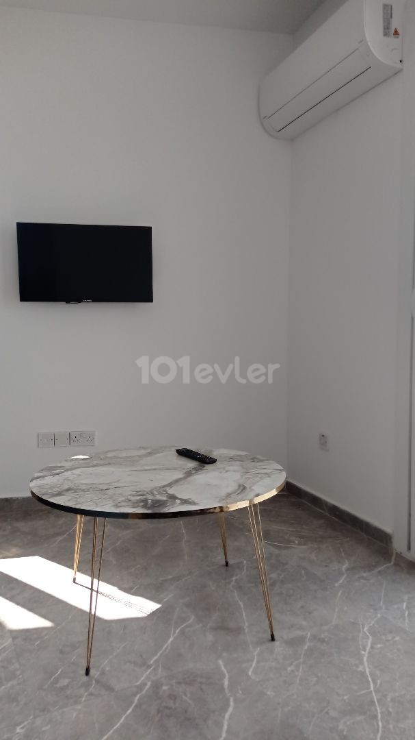 Bakanlıklar bölgesinde merkezi konumda kiralık 2+1 yeni eşyalı sıfır daire