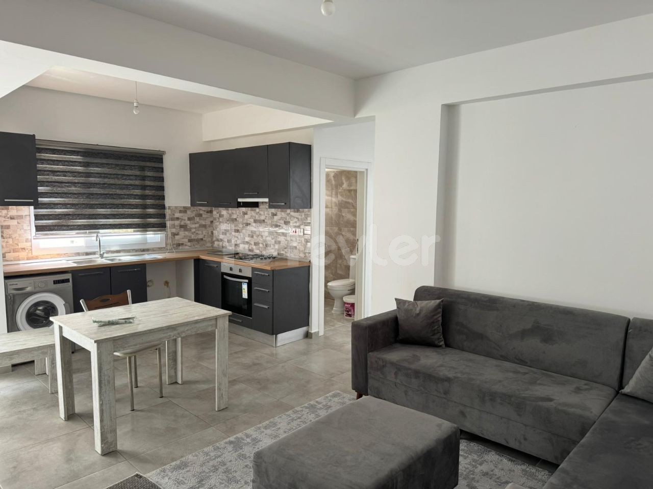 Newly furnished 2+1 flat for rent in Gönyeli area, in front of the bus stops