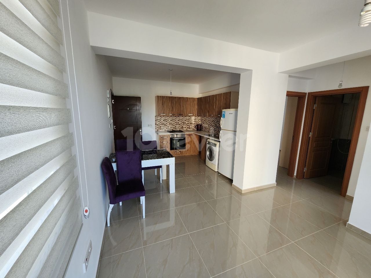 Opportunity for sale in Alsancak 2+1 apartment in a complex with pool