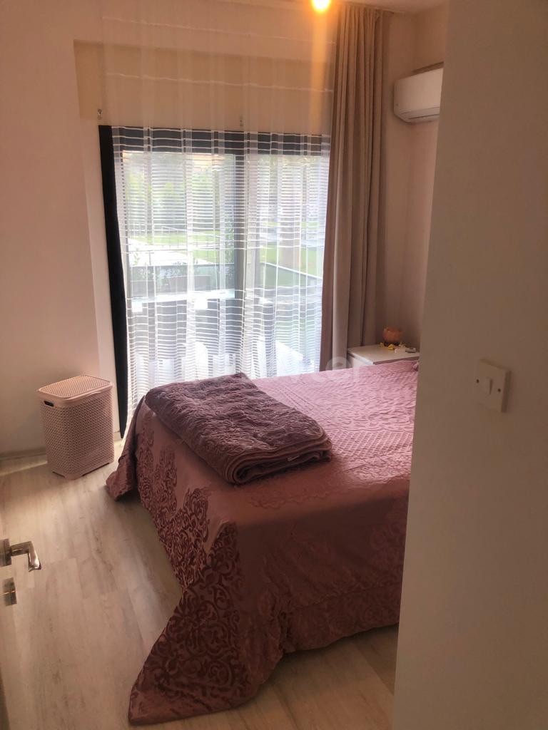 Alsancak 2+1 flat for sale with shared pool