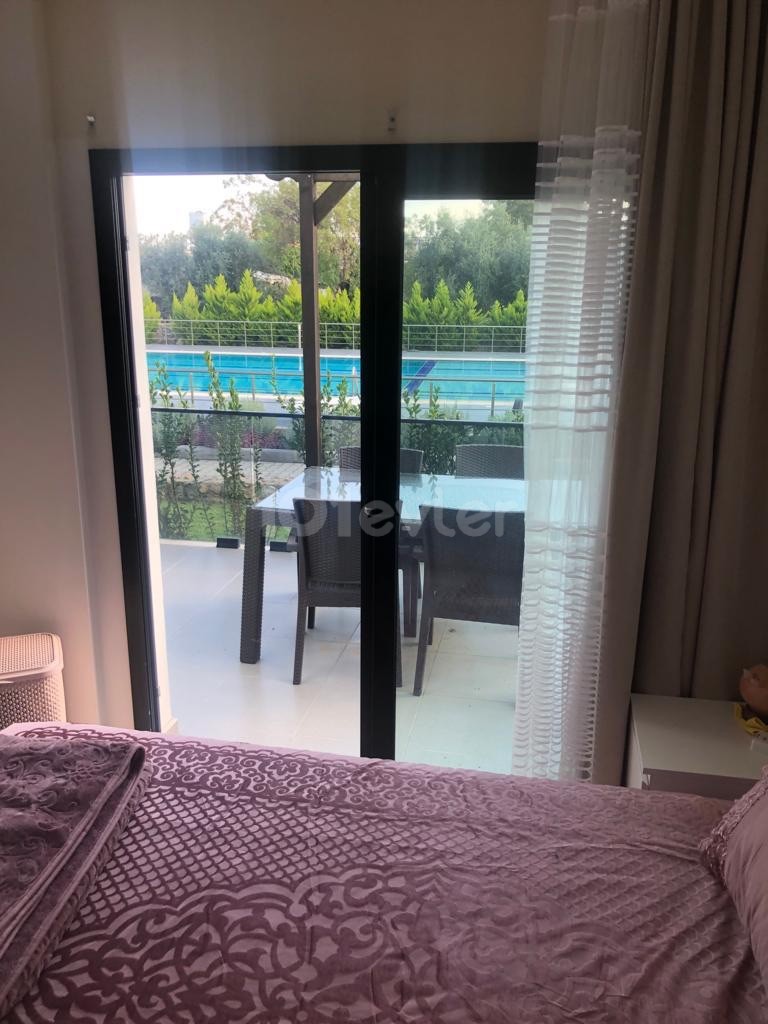 Alsancak 2+1 flat for sale with shared pool