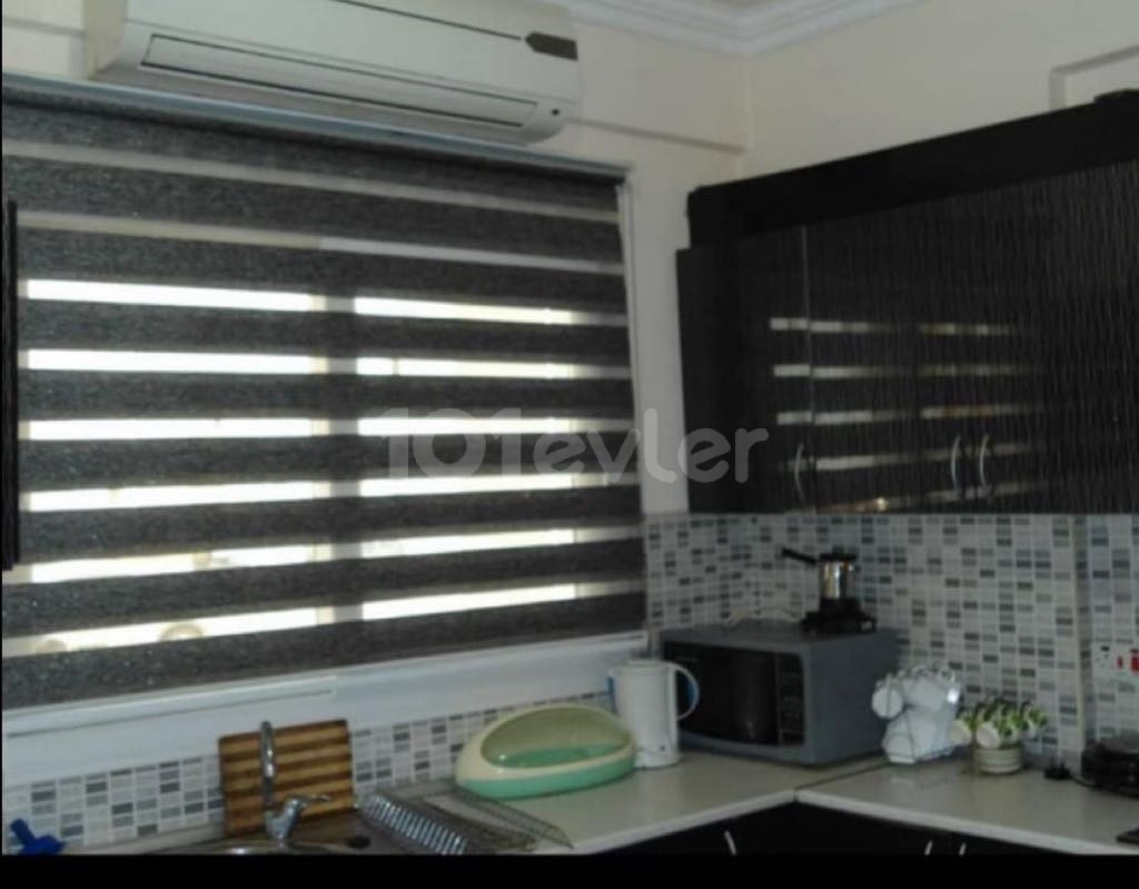 GROUND FLOOR FURNISHED 2+1 FLAT FOR SALE IN HASPOLAT MUNICIPALITY HOUSES