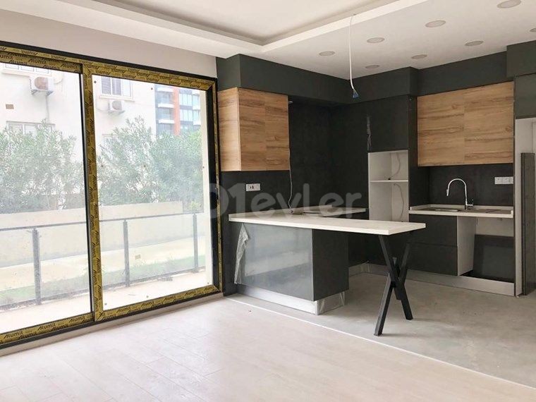 GİRNE MERKEZDE ORTAK HAVUZLU 2+1 SATILIK DAİRE