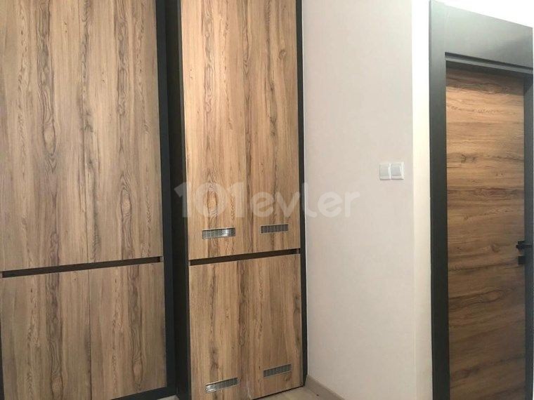 GİRNE MERKEZDE ORTAK HAVUZLU 2+1 SATILIK DAİRE