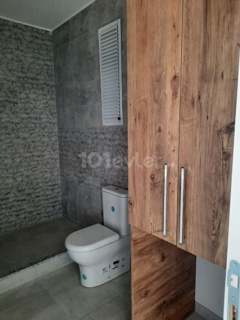 2+1 FLAT FOR SALE ON GROUND FLOOR IN KYRENIA-ALSANCAK WALKING DISTANCE TO THE SEA