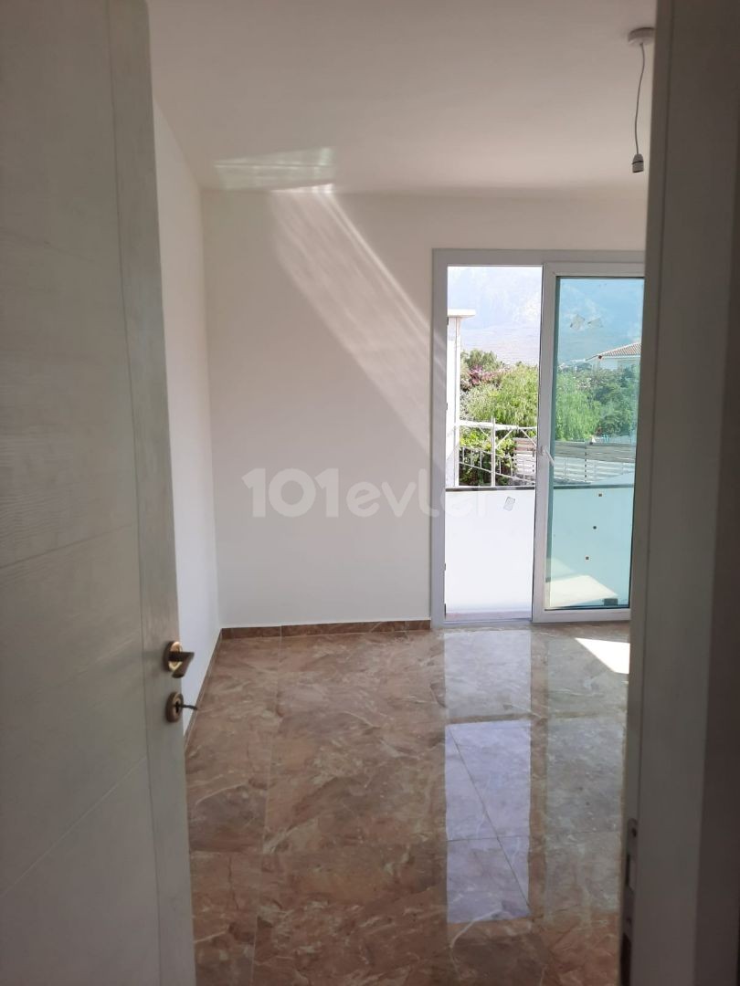 2+1 FLAT FOR SALE ON GROUND FLOOR IN KYRENIA-ALSANCAK WALKING DISTANCE TO THE SEA