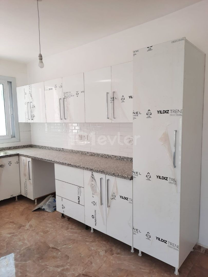 2+1 FLAT FOR SALE ON GROUND FLOOR IN KYRENIA-ALSANCAK WALKING DISTANCE TO THE SEA