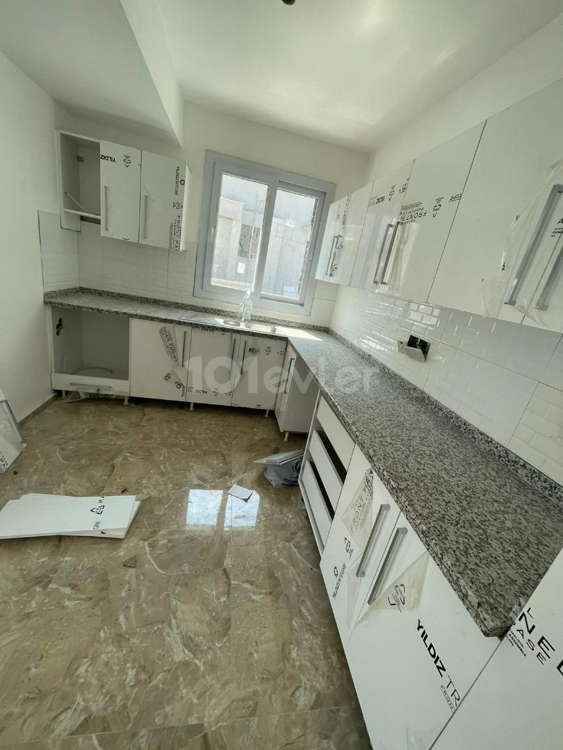 2+1 FLAT FOR SALE ON GROUND FLOOR IN KYRENIA-ALSANCAK WALKING DISTANCE TO THE SEA