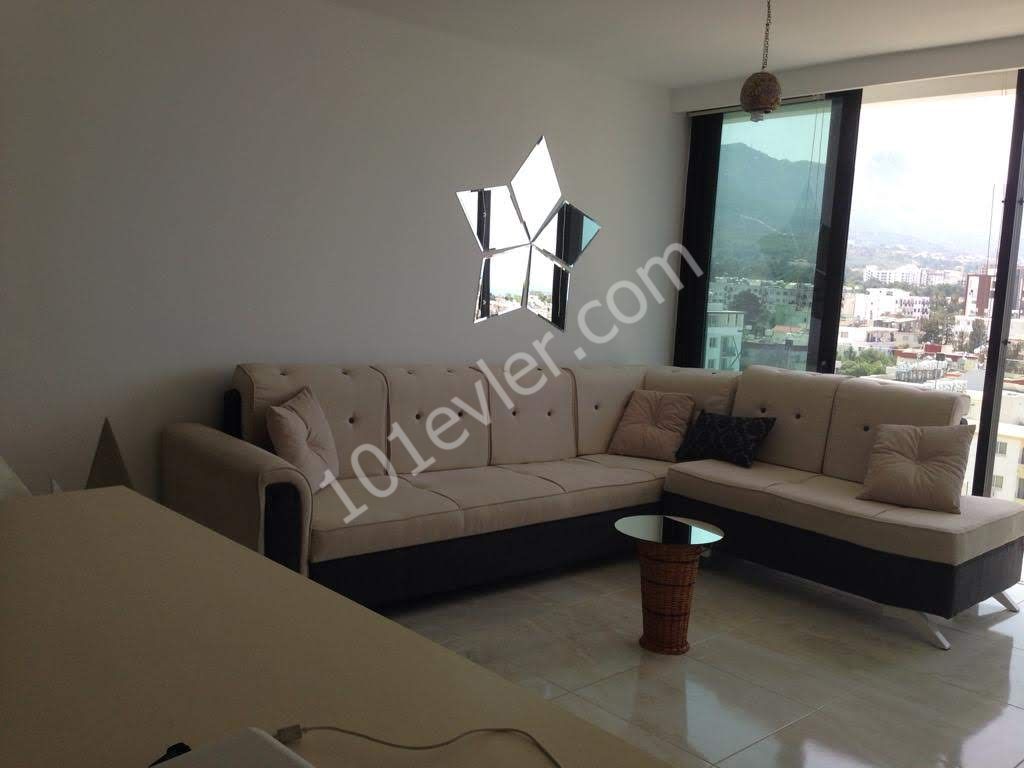 Girne merkezde mükemmel konumda ferah 1+1 yeni daire, Perla sitede, Deniz ve Dag manzaralı   0533-829-71-29