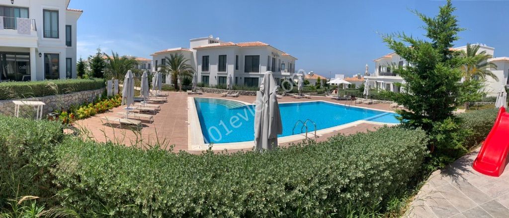 GIRNE ALSANCAKTA, CYPRUS TOWNHOUSES,SPACIOUS AND MODERN 2+1, PRIVATE GARDEN, ESCAPE BEACH 200M, SHARED POOL, VERY PRIVATE SITE WITH CLEAN AND WELL-MAINTAINED, CAFE ** 