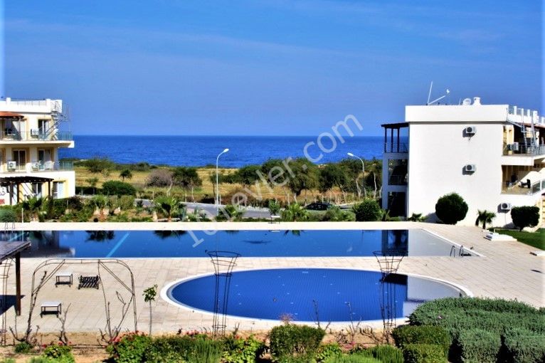 2-Bedroom + landscaped garden + beachfront + pool + gym + 1kat apartment for sale in Tatlısu ** 