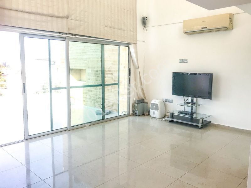 Duplex apartment for sale in Dogankoy with 2 bedrooms + swimming pool + semi-furnished + white furnished + air conditioning ** 