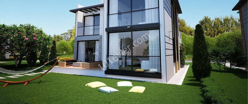 Villas for sale in Alsancak with 3 bedrooms + shared swimming pool + built with high quality materials + modern design + payment plan ** 