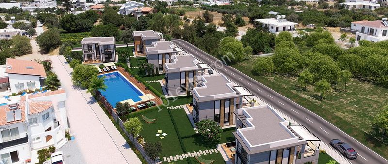 Villas for sale in Alsancak with 3 bedrooms + shared swimming pool + built with high quality materials + modern design + payment plan ** 