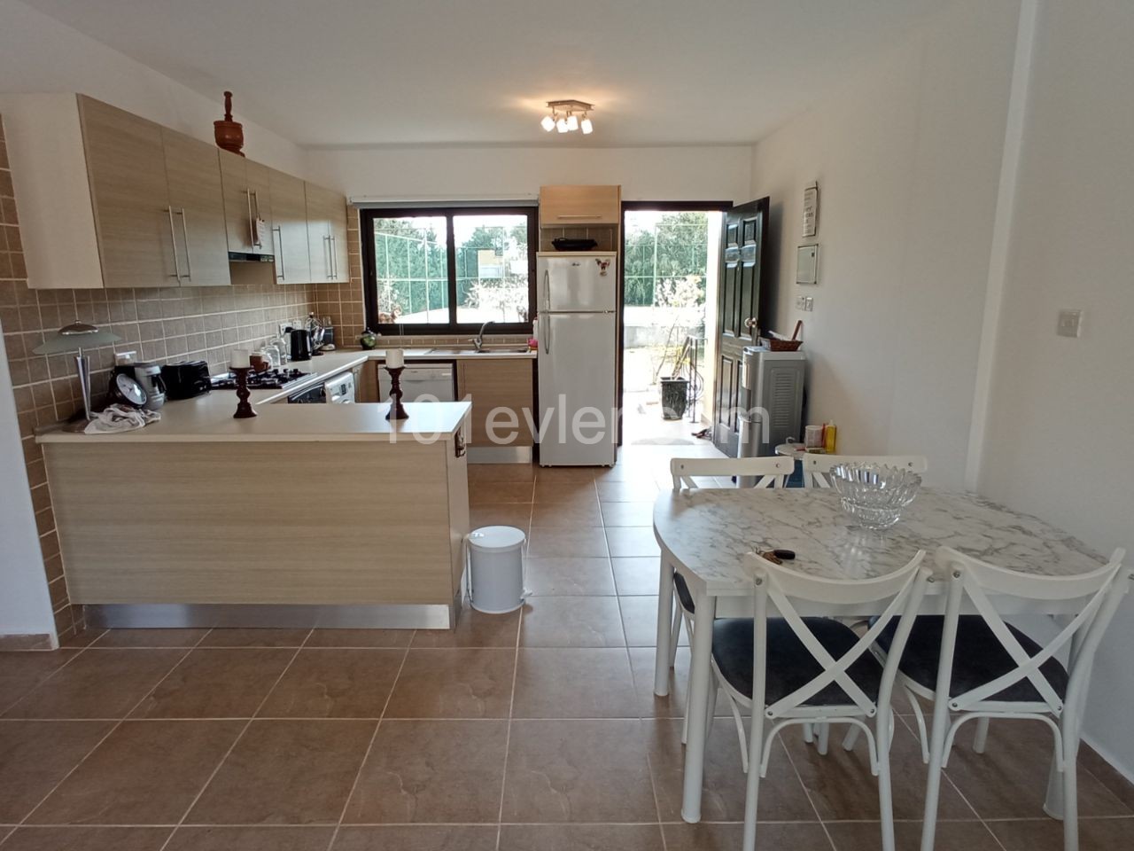 Tastefully Furnished and Well Maintained - 2 + 1 Garden Apartment with Shared Pool  - Ref GR016