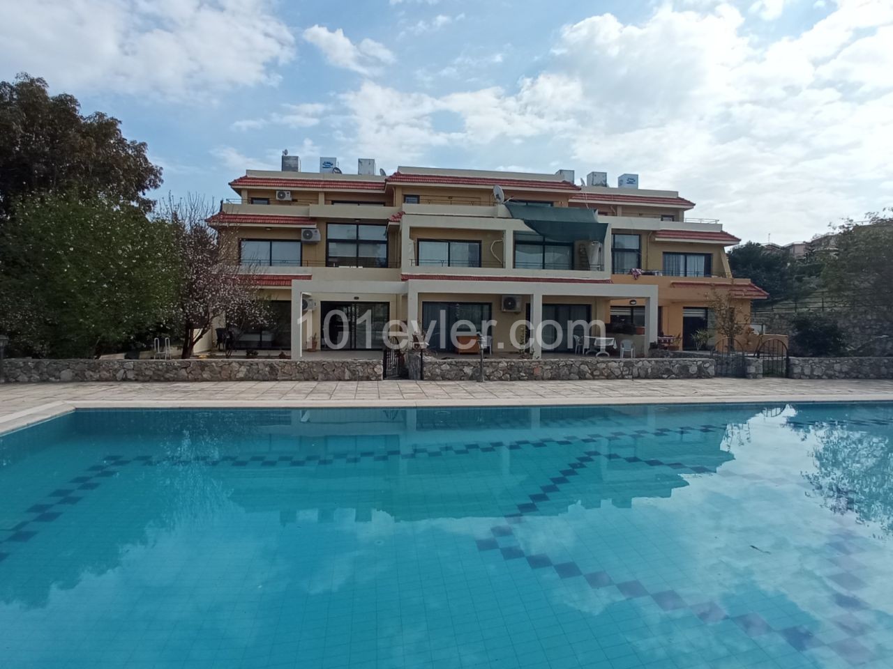 Tastefully Furnished and Well Maintained - 2 + 1 Garden Apartment with Shared Pool