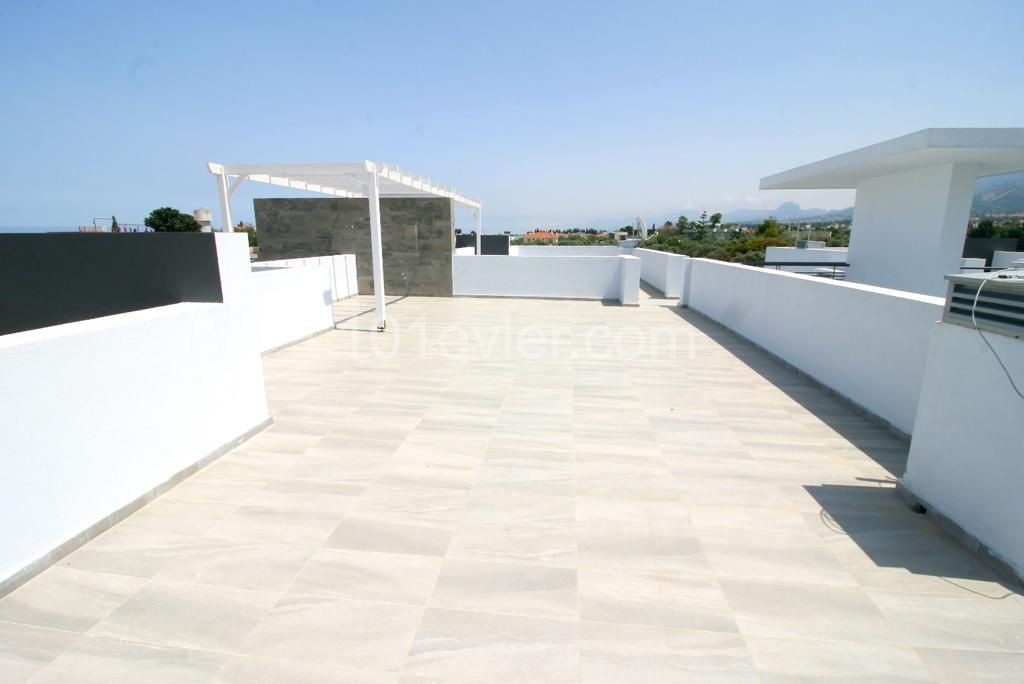 Newly Constructed 2 + 1 Apartment with large roof terrace and shared pool in the heart of Ozankoy