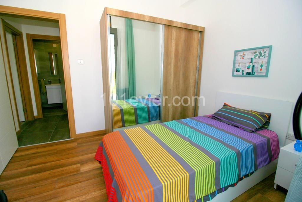 Newly Constructed 2 + 1 Apartment with large roof terrace and shared pool in the heart of Ozankoy