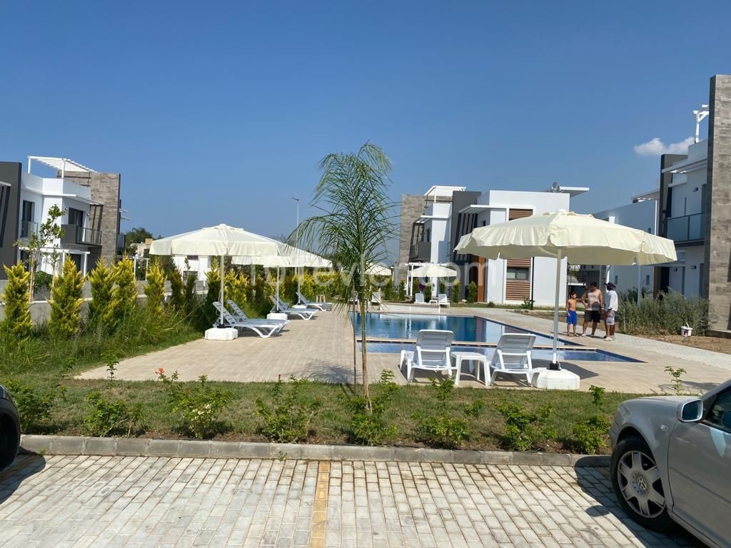 Newly Constructed 2 + 1 Apartment with large roof terrace and shared pool in the heart of Ozankoy