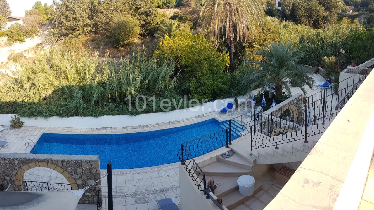 Perfectly positioned in the quaint village of Ozankoy - 3 bedroom duplex apartment with shared pool