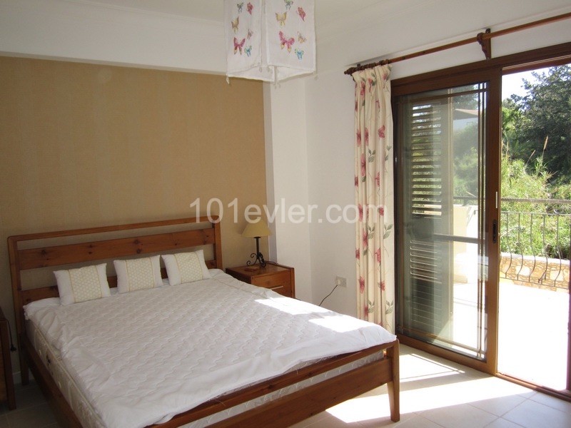 Perfectly positioned in the quaint village of Ozankoy - 3 bedroom duplex apartment with shared pool