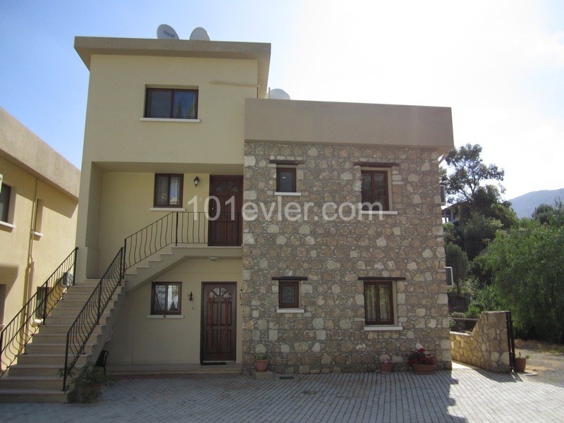 Perfectly positioned in the quaint village of Ozankoy - 3 bedroom duplex apartment with shared pool