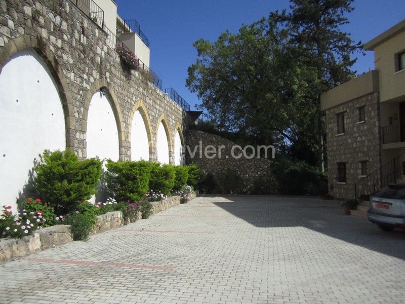 Perfectly positioned in the quaint village of Ozankoy - 3 bedroom duplex apartment with shared pool