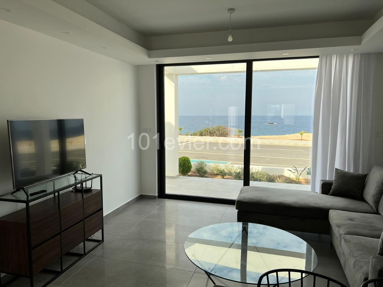 Brand New Luxury 2 + 1 Garden Apartment Front Line to the Sea with Shared Pool and Gym