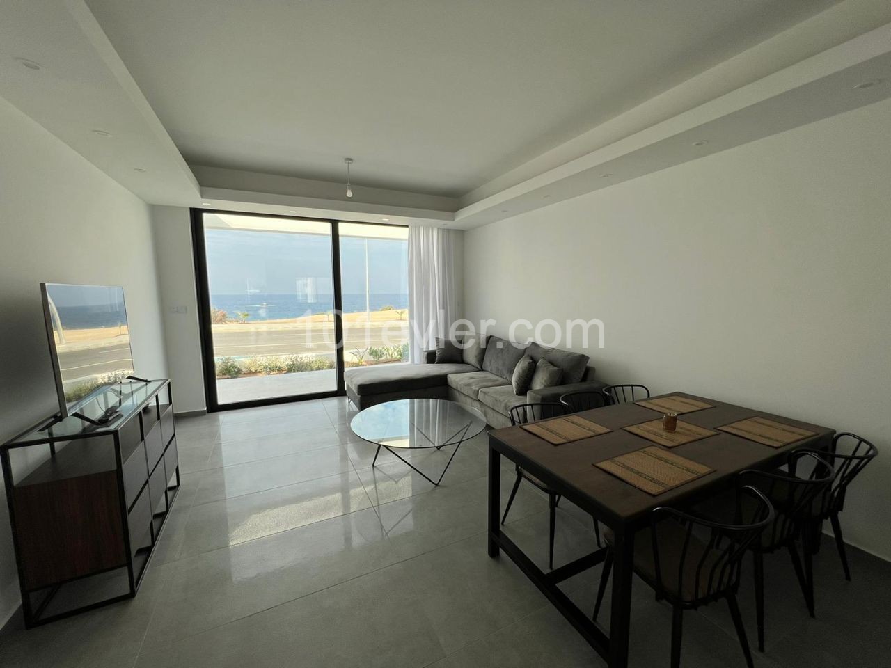 Brand New Luxury 2 + 1 Garden Apartment Front Line to the Sea with Shared Pool and Gym