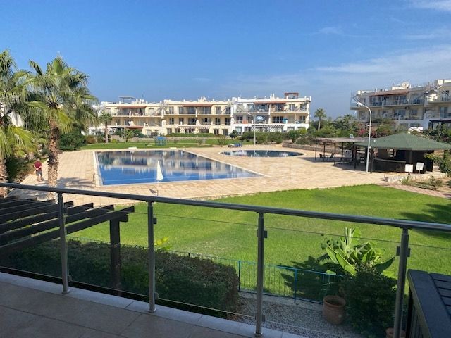 A lovely peaceful 2 bedroom apartment with shared pools and well maintained gardens with stunning views + Exchange title deeds in owners name