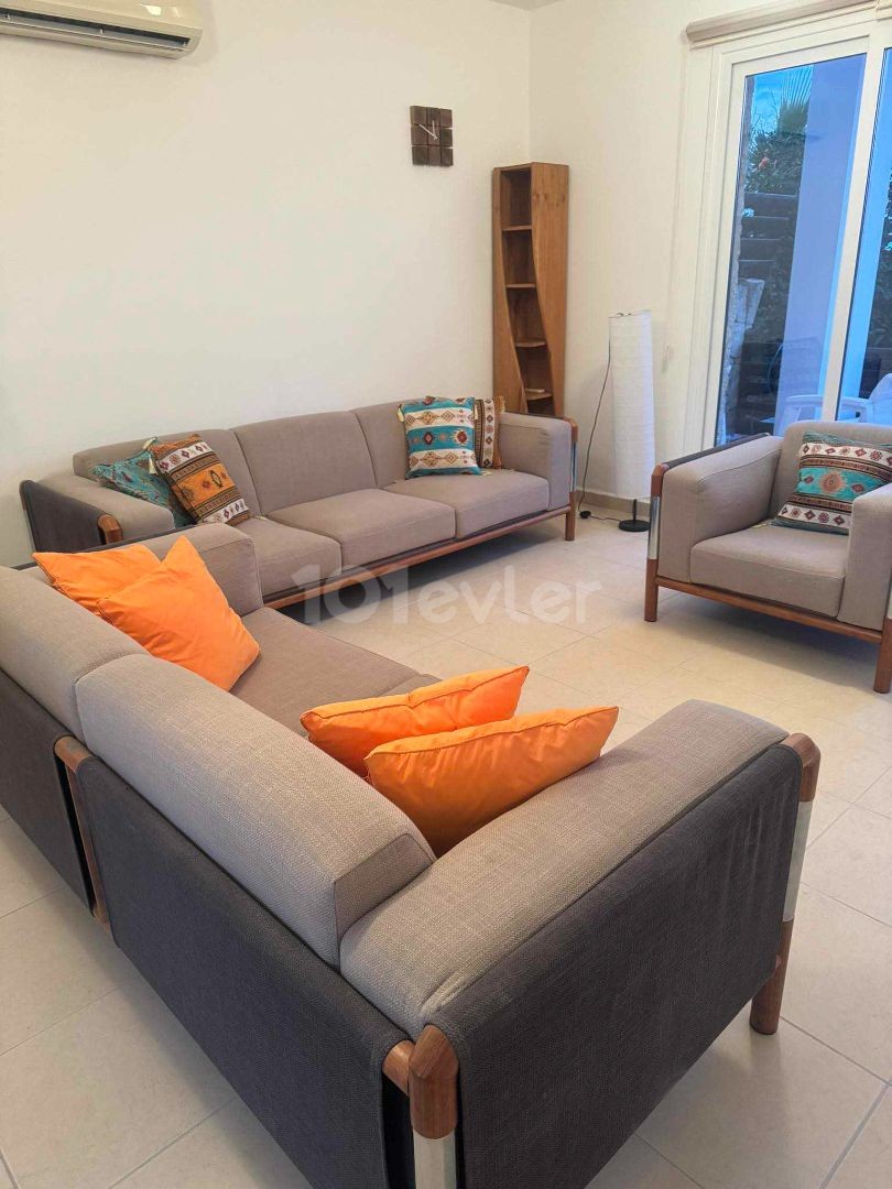 Well maintained 2 bedroom fully furnished garden apartment + communal pool + gym