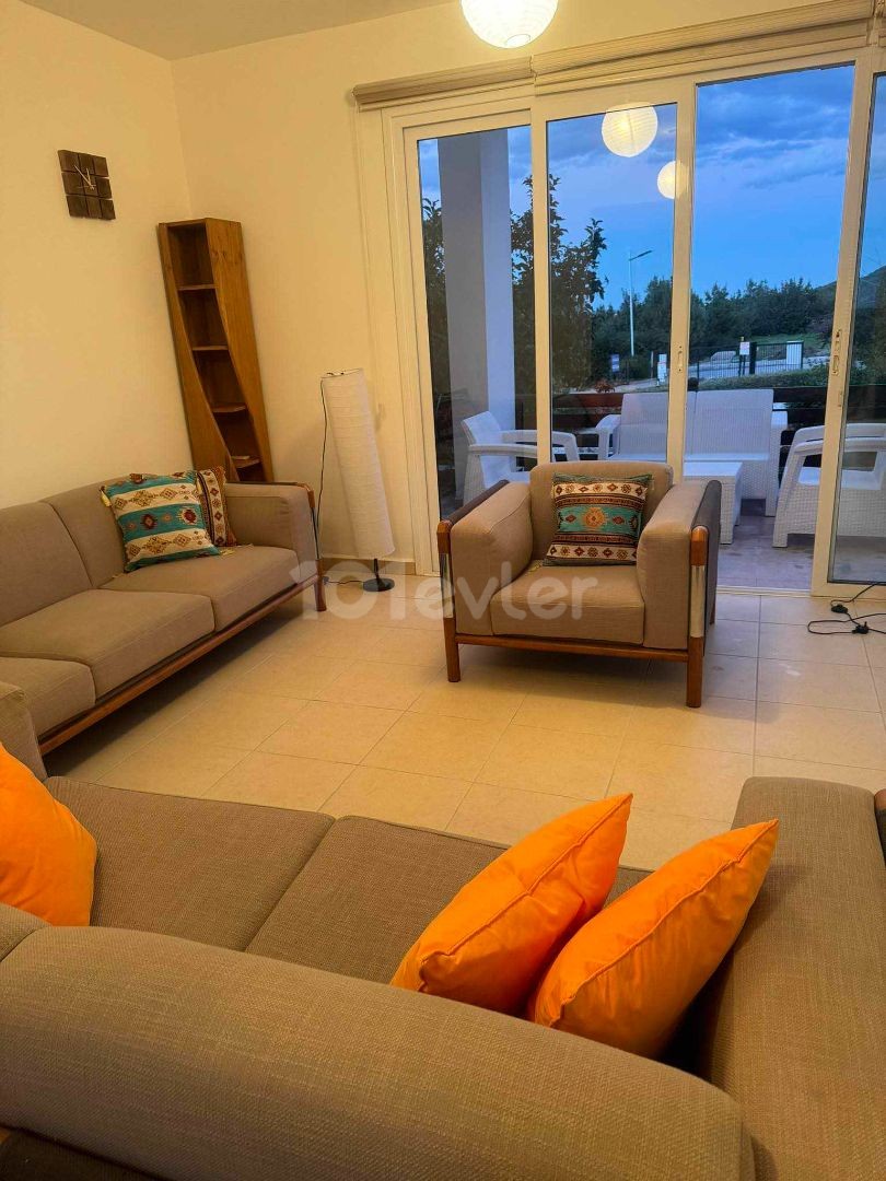 Well maintained 2 bedroom fully furnished garden apartment + communal pool + gym