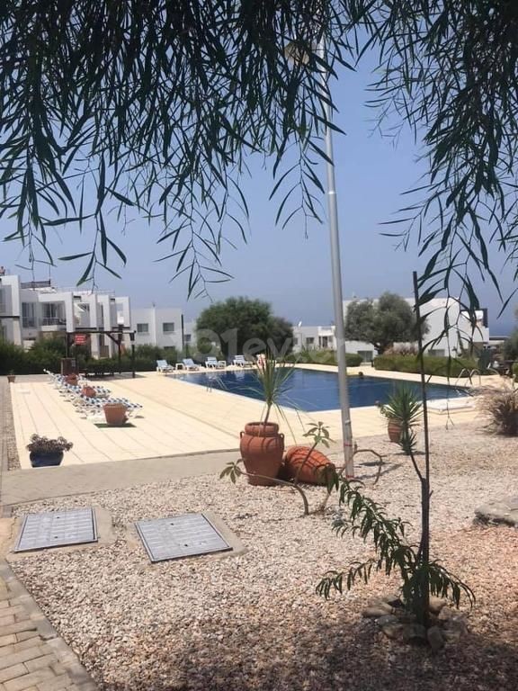 Well maintained 2 bedroom fully furnished garden apartment + communal pool + gym