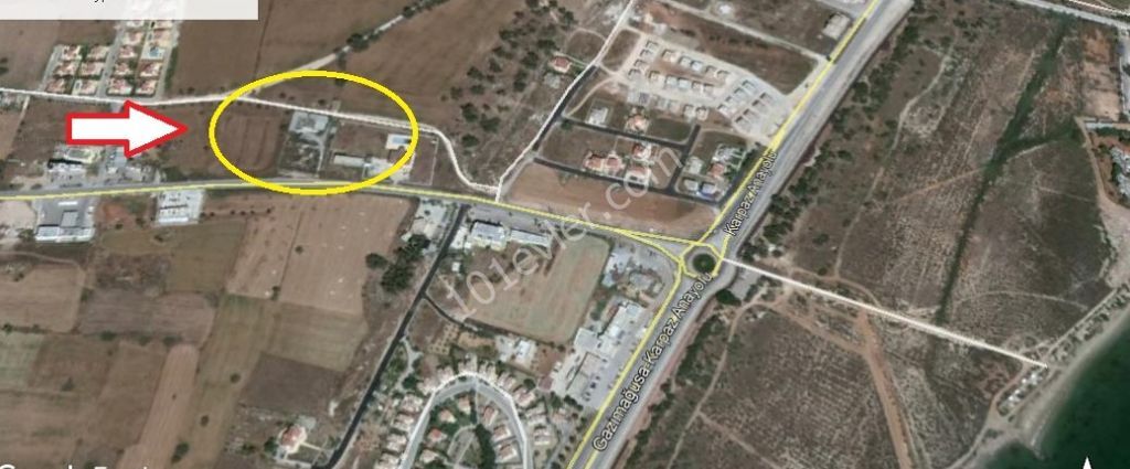 INVESTMENT ON THIS LAND, GREAT LOCATION ON MAIN ROAD..