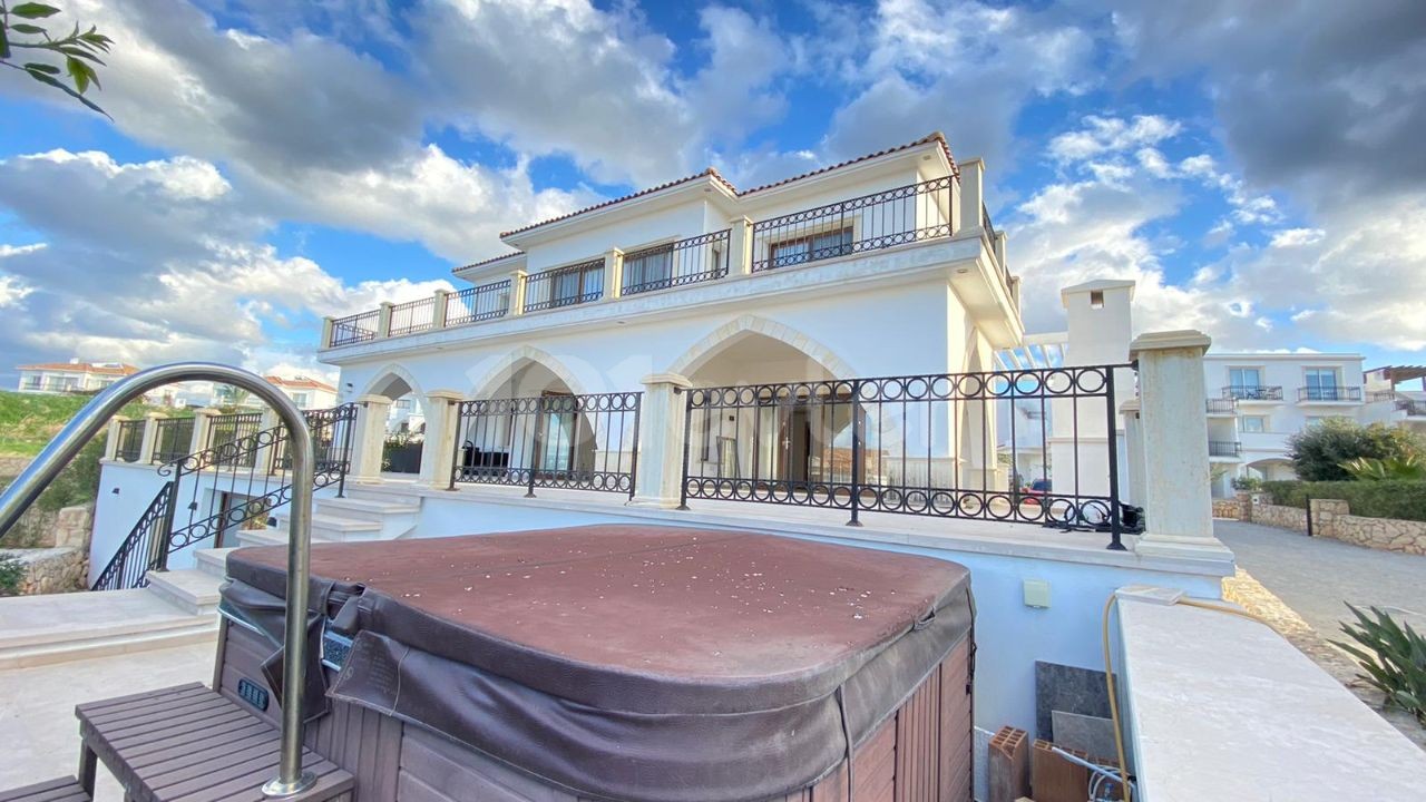 seafront villa for sale