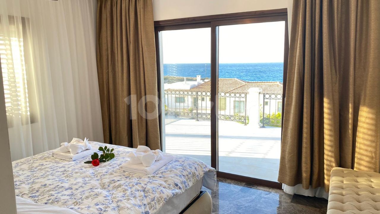 seafront villa for sale