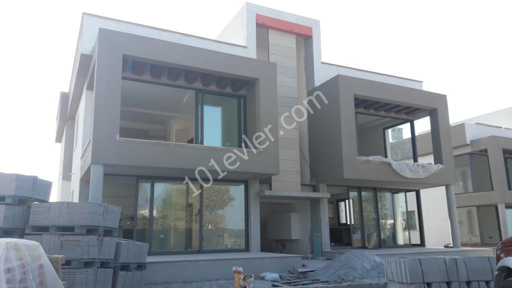 2+1 flats in Cyprus Girne Alsancak with modern design large terrace and garden use.