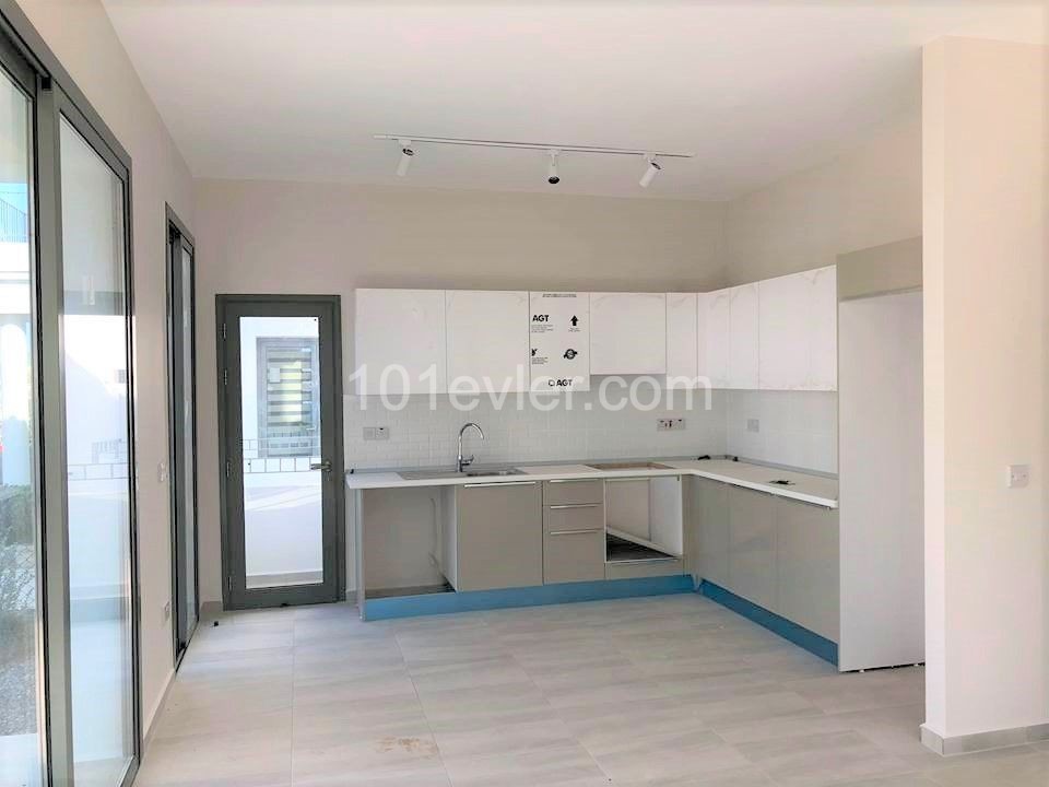 THE MOST PRESTIGIOUS SITE IN KYRENIA ALSANCAK IN CYPRUS OFFERS A GARDEN FLOOR APARTMENT ** 