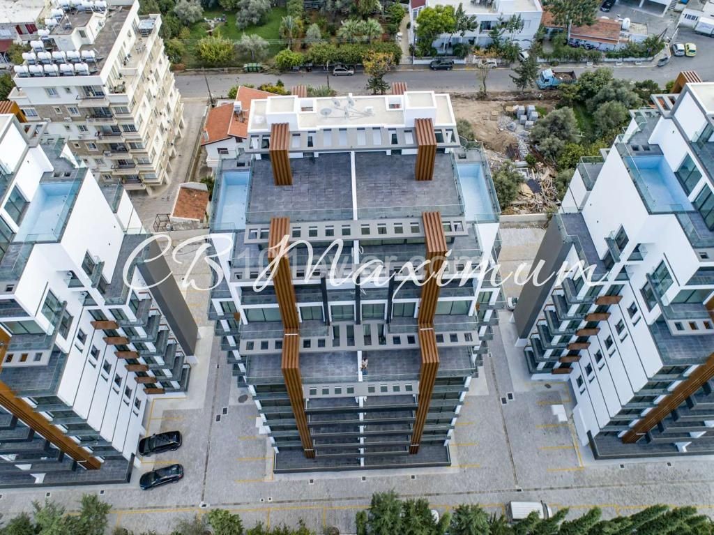 Kıbrıs Girne Merkezde Site İçinde Satılık Türk Malı Modern Mimari 2+1 Daireler