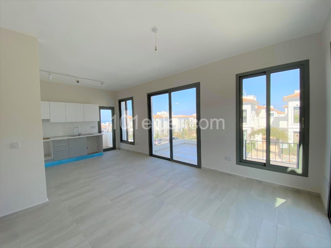 TOP FLOOR APARTMENT IN TOWN HOUSES, THE MOST PRESTIGIOUS SITE OF ALSANCAK IN KYRENIA, CYPRUS ** 